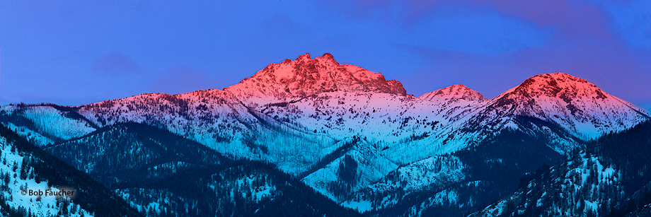 Winter first light of morning strikes the top of aptly-named Sun Mountain