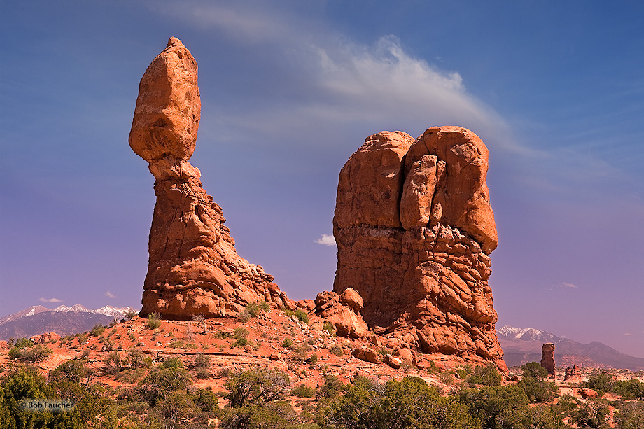 The total height of Balanced Rock, one of the most popular features of Arches National Park, is about 128 feet (39 m), with the...