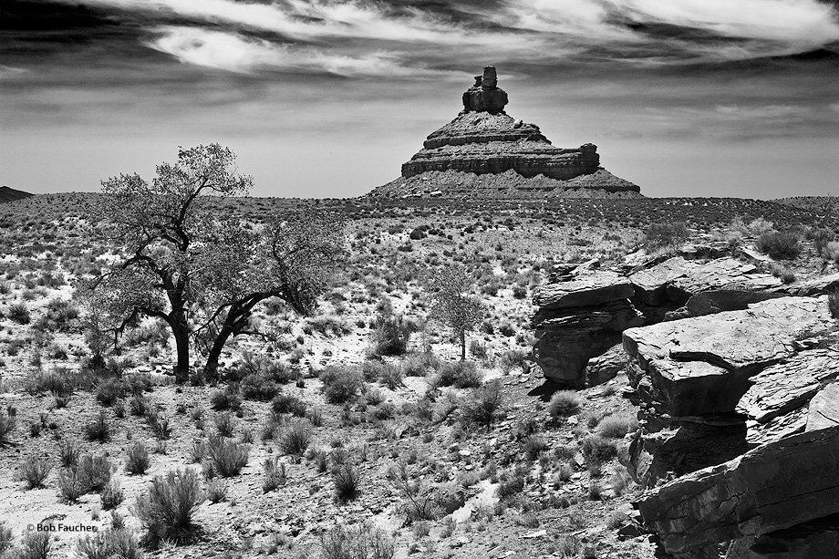 Franklin Butte stands in the open valley floor of Valley of the gods, a less-visited neighbor of Monument Valley. The formations...