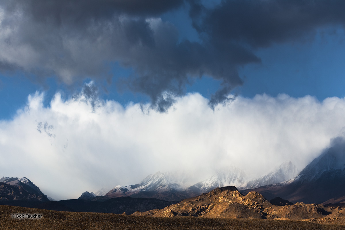 The eastern slopes of the Sierras, above the Owens Valley, are blanketed by snow early on a Fall morning