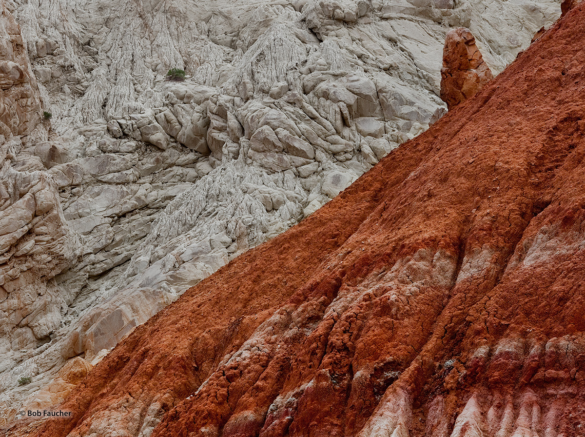 Colorful Carmel and Entrada Formations opposed in the Cockscomb along the Cottonwood Canyon. The once horizontal layers of colorful...