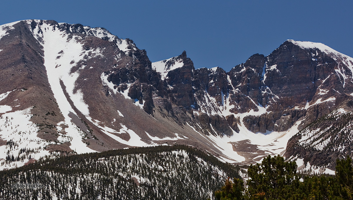 Wheeler Peak, far right, standing at over 13,000 feet, provides classic examples of the erosional forces of glaciation. Ice pried...