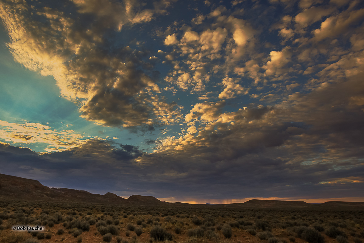 Early morning storm on the horizon between Sam's Mesa and The Big Ridge in the San Rafael Desert