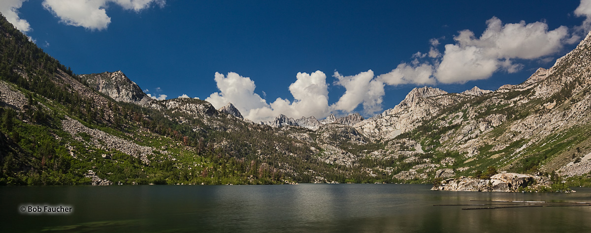 Morning light floods Lake Sabrina and the Sierra Nevada mountains surrounding it