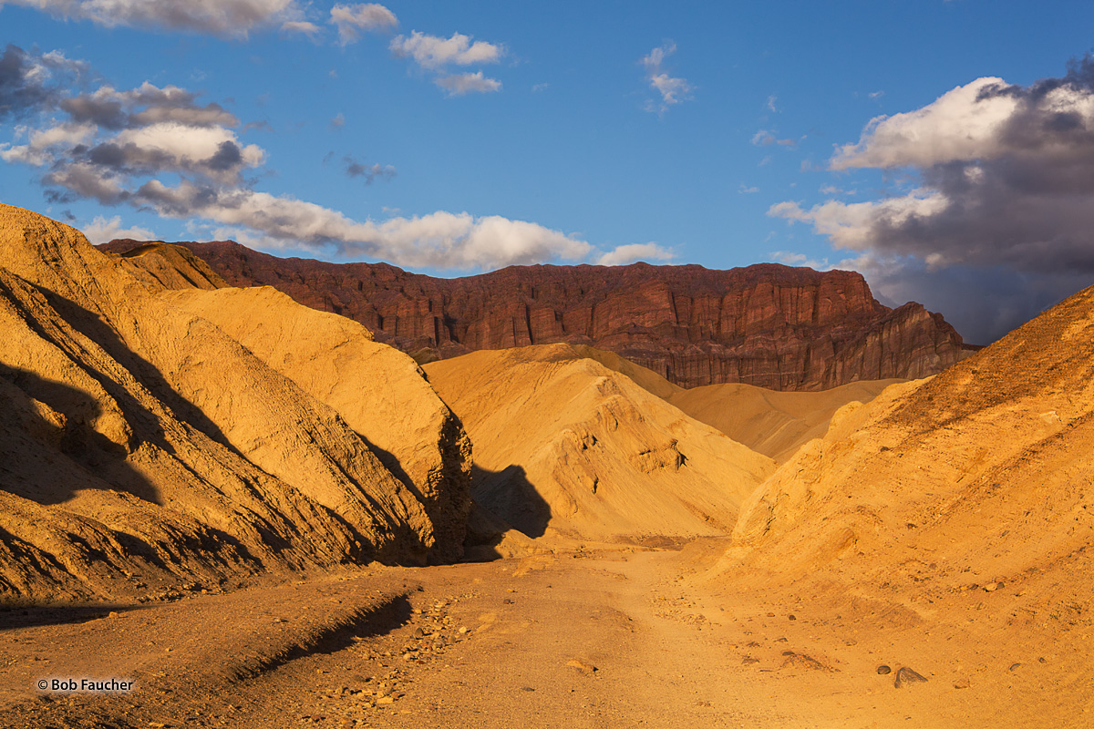 The last half of a mile to the Red Cathedral continues uphill through the varying canyon widths. The redness of the rock gets...