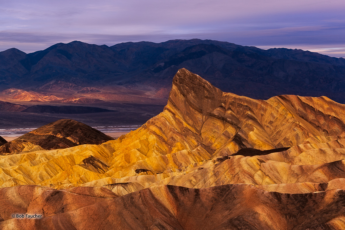 Manly Beacon is a towering spire that rises above the Death Valley badlands. From the Zabriskie vantage point look towards the...