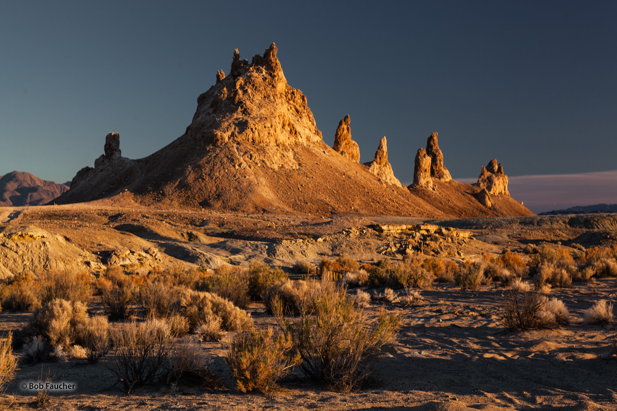 Afternoon light bathes a few of the more than 500 tufa formations at Trona Pinnacles, some of these fantastic formations rise...