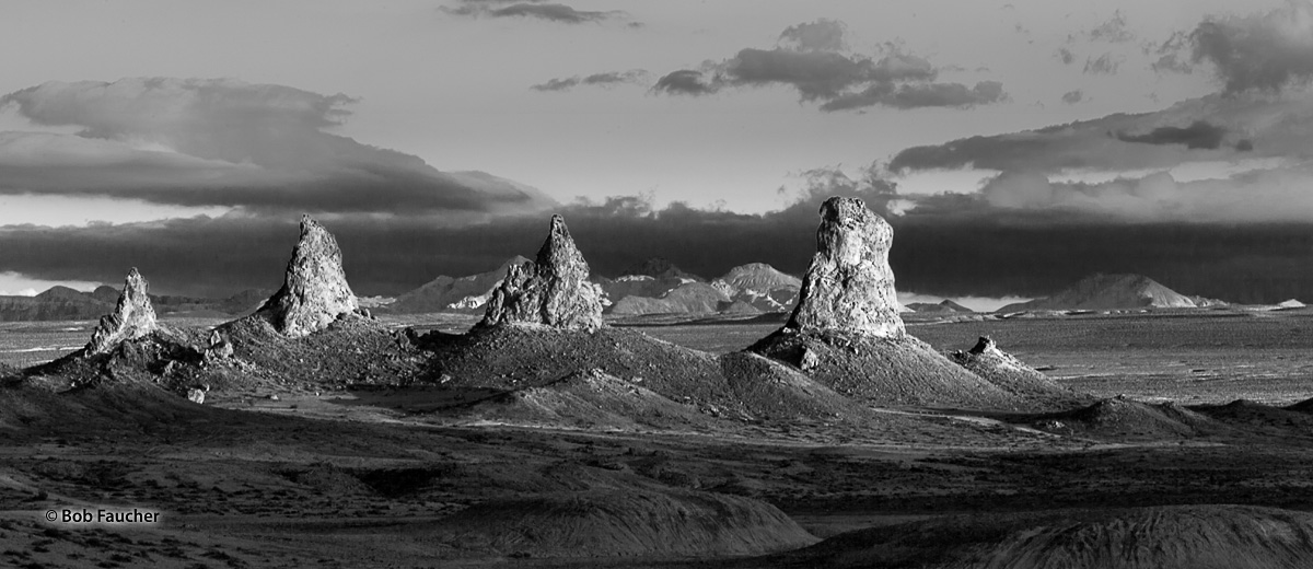 Morning light catches a lineup of tufa spires in Trona Pinnacles, a National Natural Landmark in the Searles Lake Basin of the...