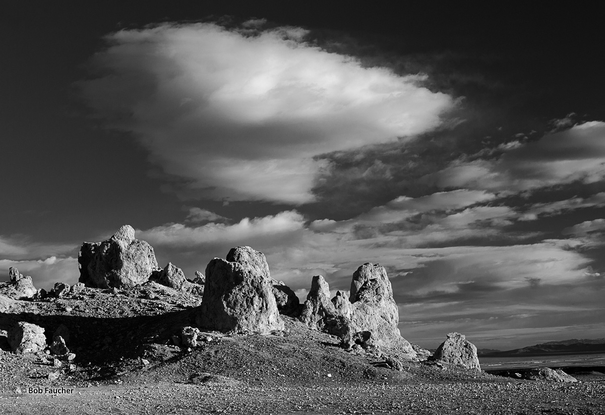 Morning light casts long, deep shadows from an outcropping of tufa in Trona Pinnacles, a National Natural Landmark in the Searles...