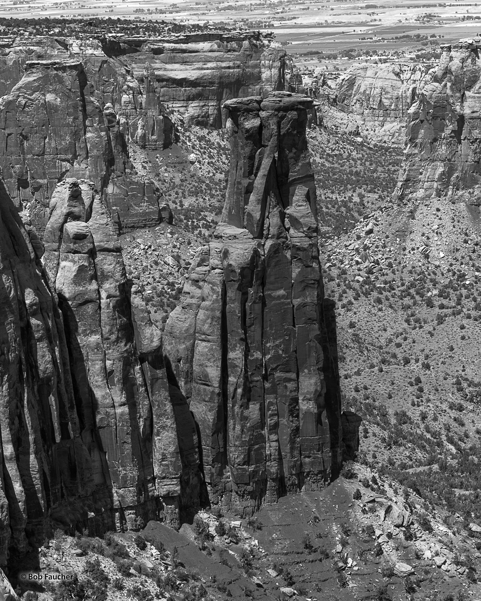 This large stone pillar marks the terminus of ridge with Otto's Trail upon it. Monument Canyon and Fruita are seen below below...