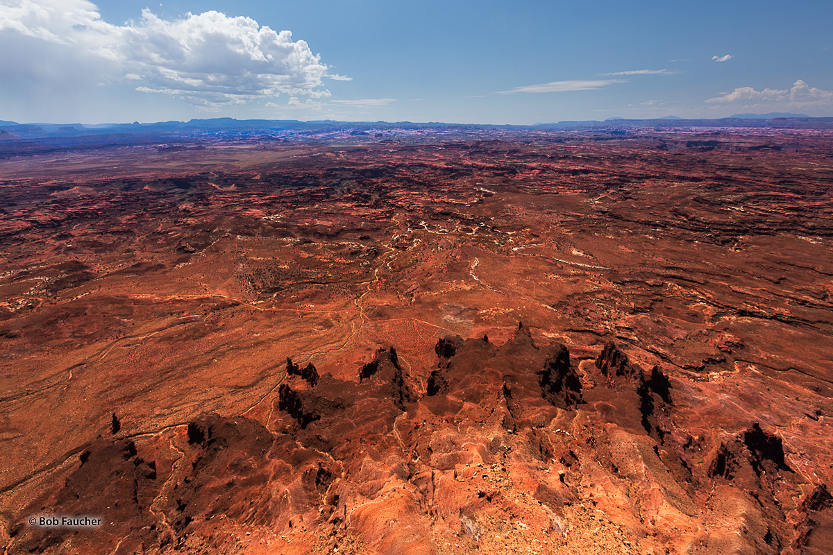 Barren expanses of the Needles section of Canyonlands NP. Near the horizon is the Island in the Sky section.