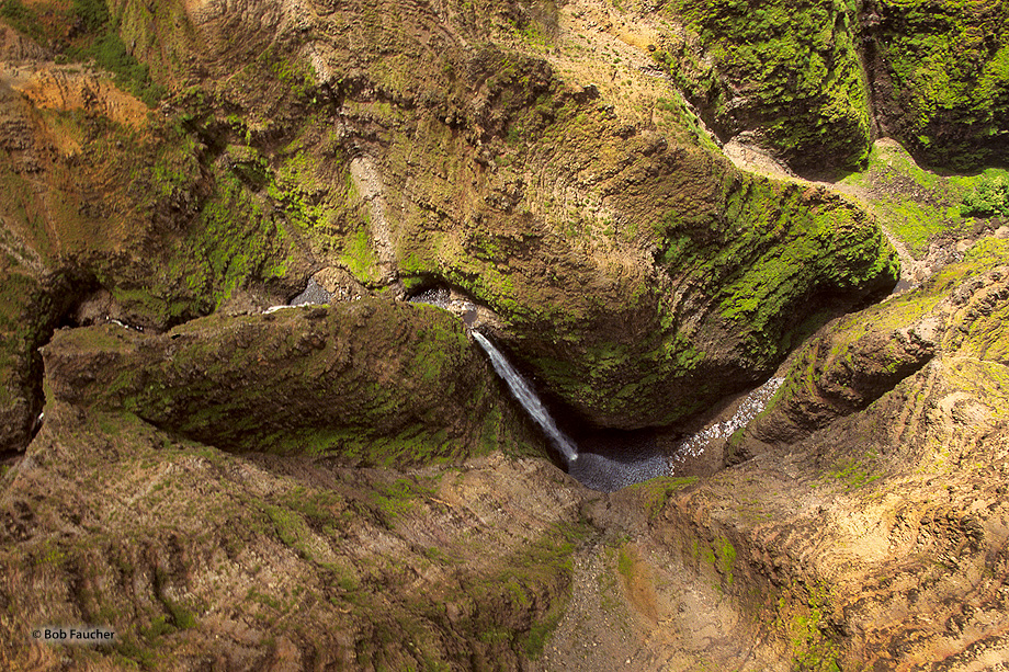 Looking down into Wiamea canyon from a helicopter above Waipo'o Falls. I asked the pilot to flip the bird over on its side as...
