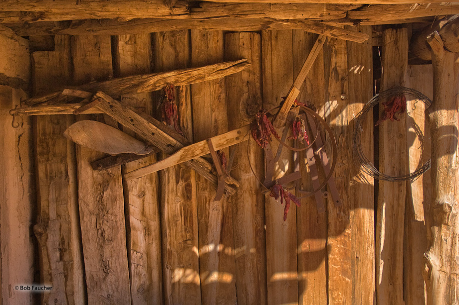 Tools of the trade for workers on a ranch hang on the workshop wall.